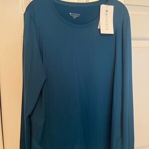Athleta long sleeve teal shirt, with thumb holes.